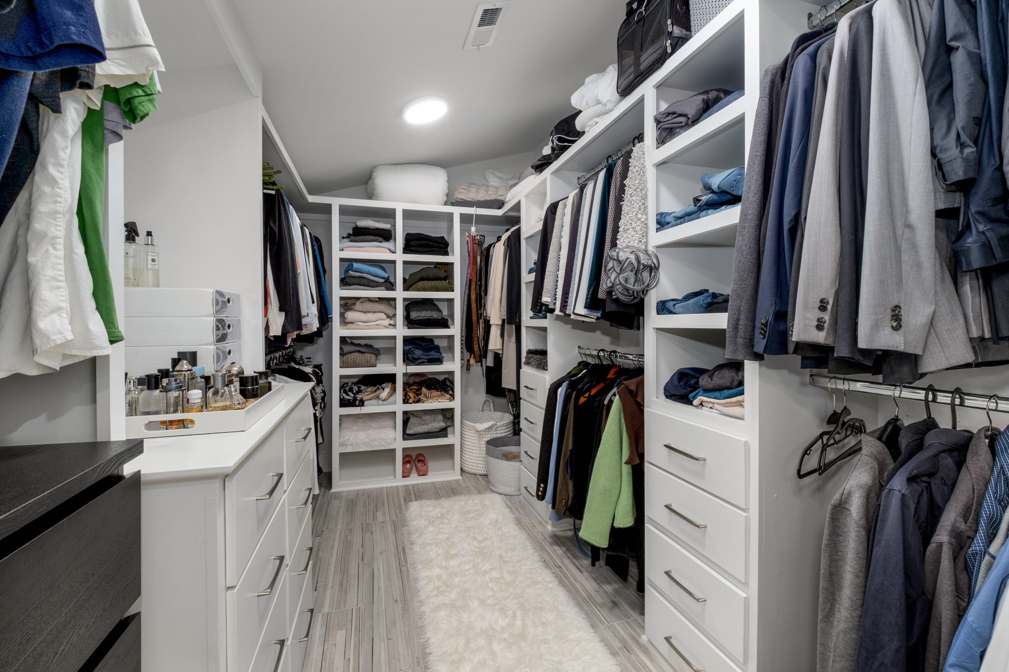 4628 Shys Hill Road Nashville, TN 37215 - Photo 31 of 42 a view of walk in closet with clothes and shoes