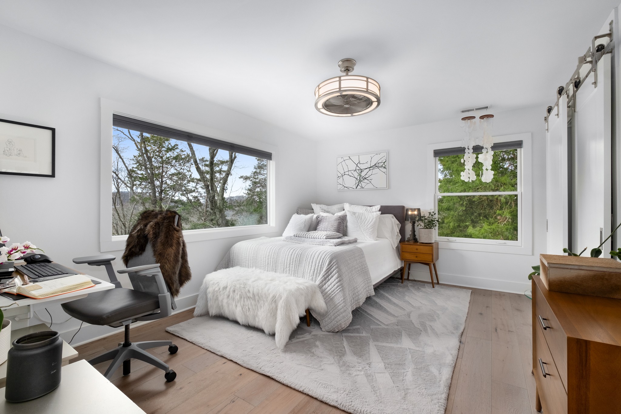 4628 Shys Hill Road Nashville, TN 37215 - Photo 33 of 42 a bedroom with a bed and a large window