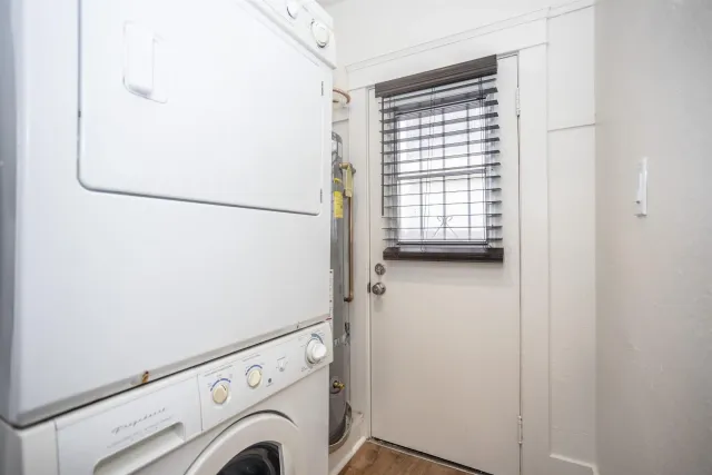 a view of storage and utility room with washer and dryer
