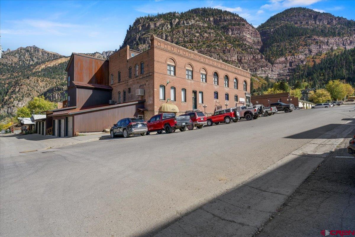 708 Main Street, Unit 3 Ouray, CO 81427 - Photo 28 of 28 a building with trees in front of it