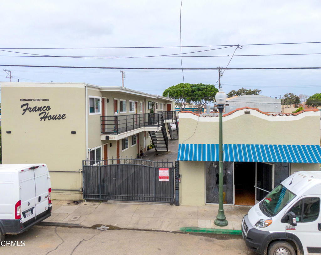 633 Meta Street Oxnard, CA 93030 - Photo 2 of 11 a view of a patio with table and chairs