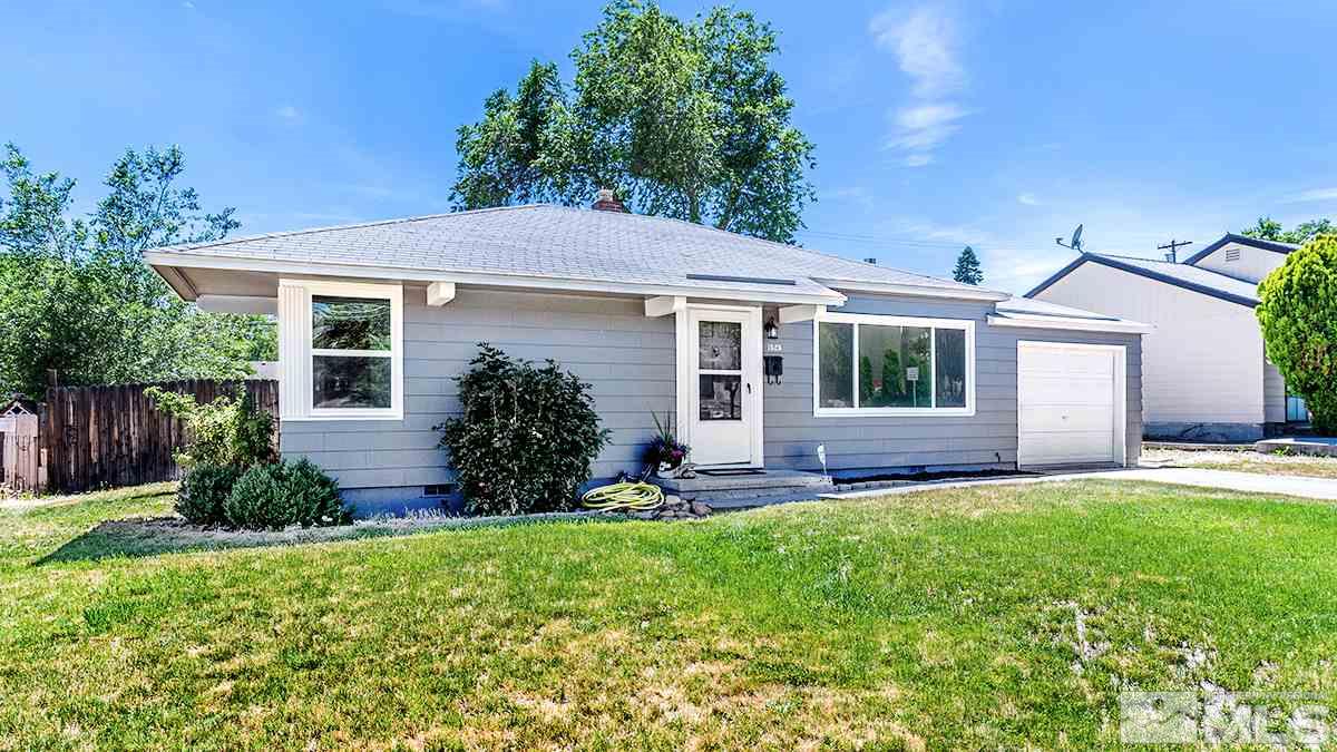 1525 Keystone Avenue Reno, NV 89503 - Photo 1 of 16 front view of a house with a yard