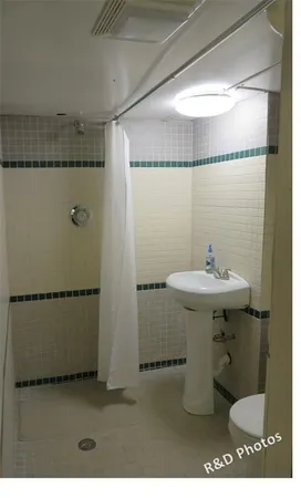 a bathroom with a sink and mirror