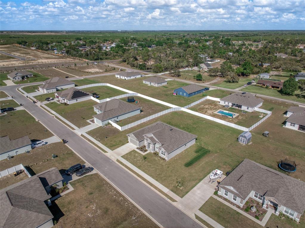 1113 Caloosa Ridge Way Babson Park, FL 33827 - Photo 14 of 77 an aerial view of residential houses with outdoor space