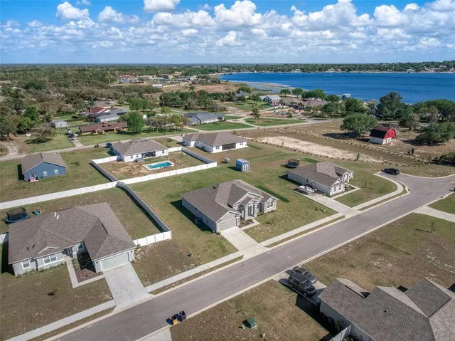 a view of a dining room with furniture and a table