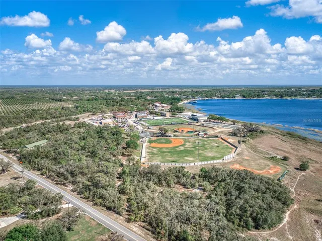 a bedroom with a bed and a television