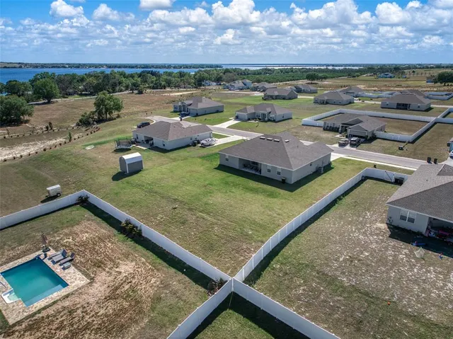 a kitchen with stainless steel appliances a sink stove top oven and cabinets