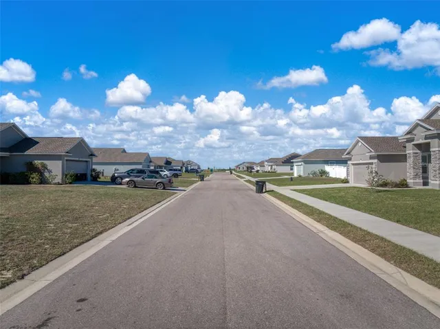 a view of storage and utility room with a window