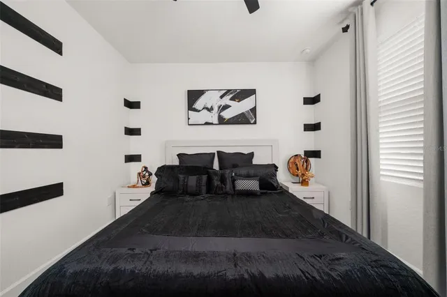 a large kitchen with stainless steel appliances granite countertop lots of counter space a sink and dishwasher a stove top oven with wooden floor