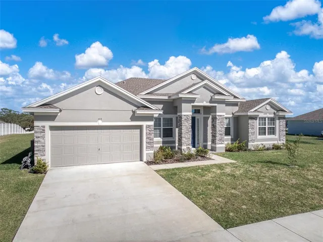front view of house with a yard