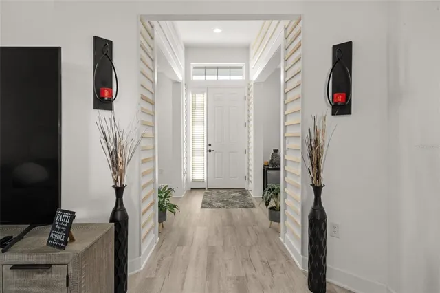 a white bath tub sitting in a en suite bathroom
