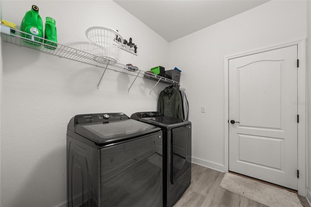 1113 Caloosa Ridge Way Babson Park, FL 33827 - Photo 38 of 77 a view of storage and utility room with a window