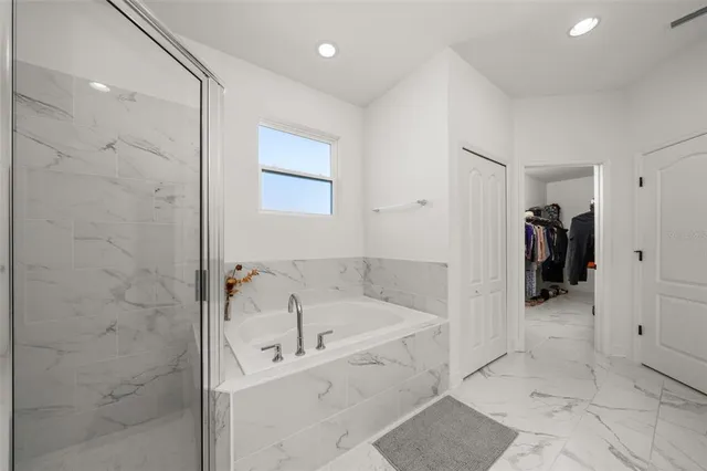 a view of front door with wooden floor