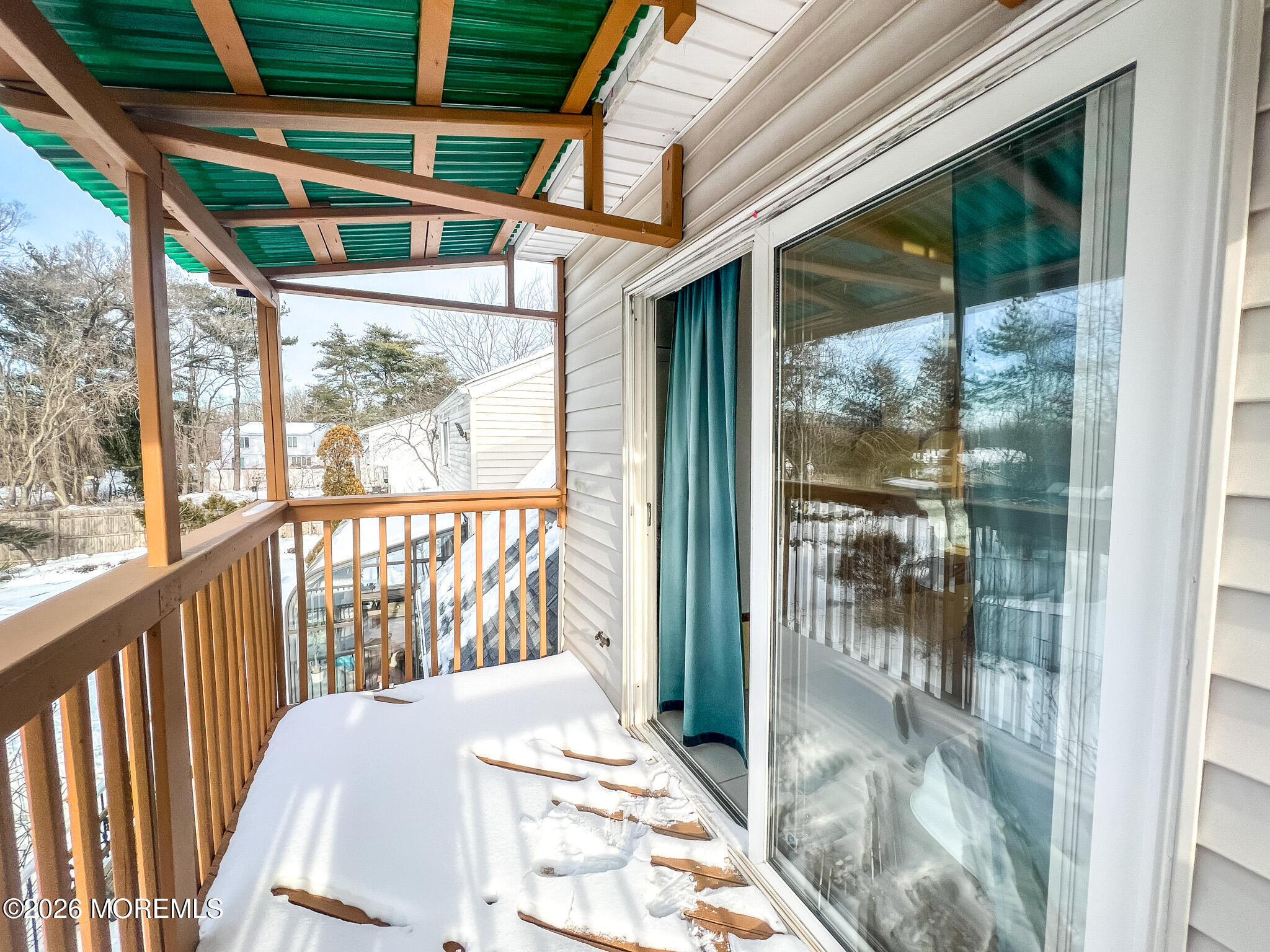 6 Hillcrest Road Manalapan, NJ 07726 - Photo 4 of 6 a view of a balcony with wooden floor