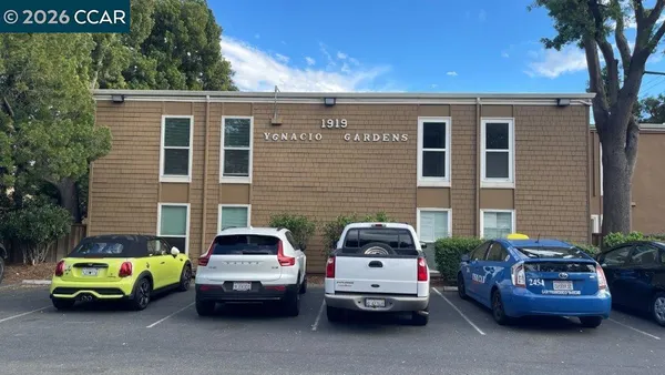 a car parked in front of a house