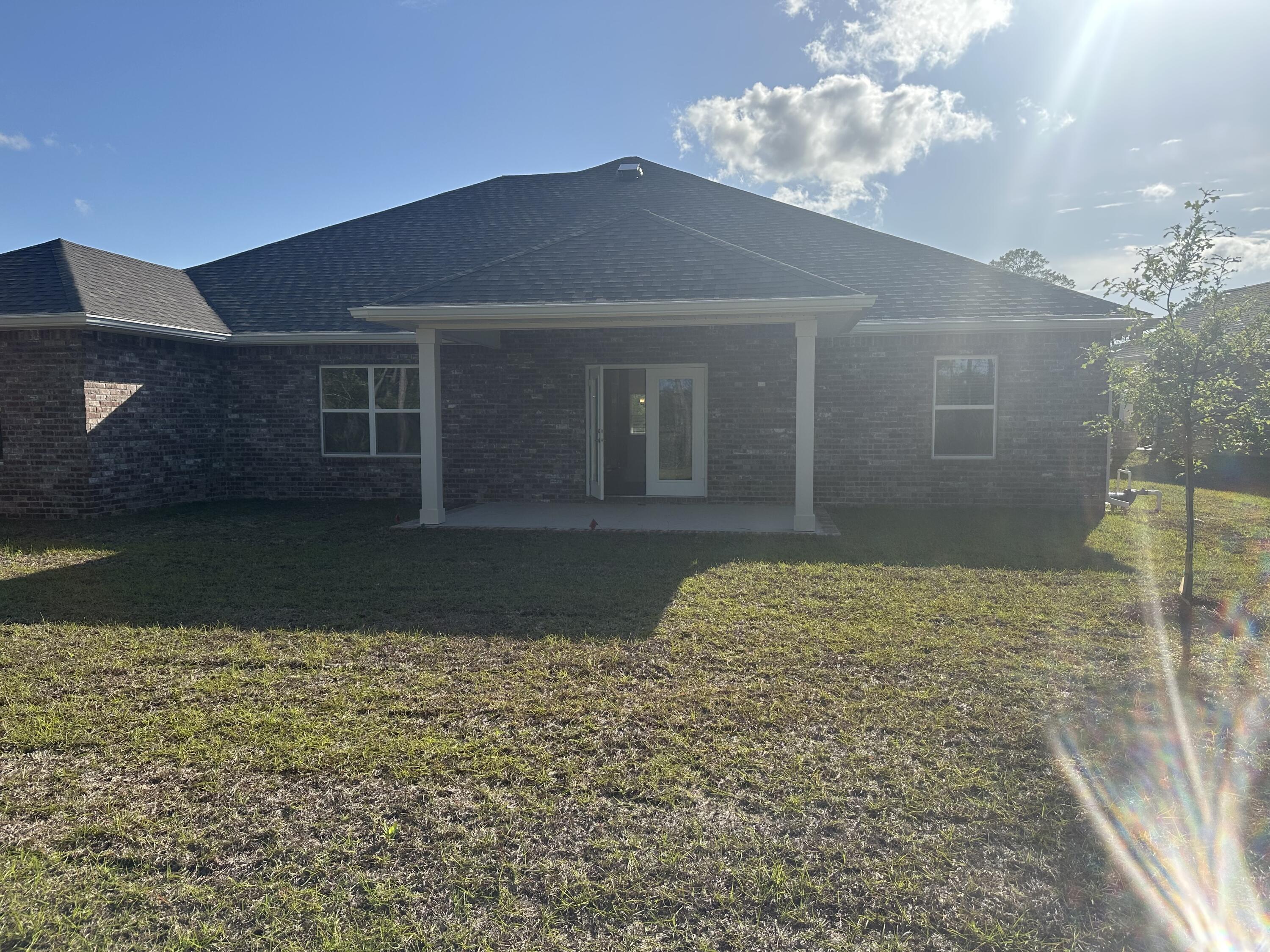 144 Bentgrass Road South Freeport, FL 32439 - Photo 6 of 8 a house view with a outdoor space