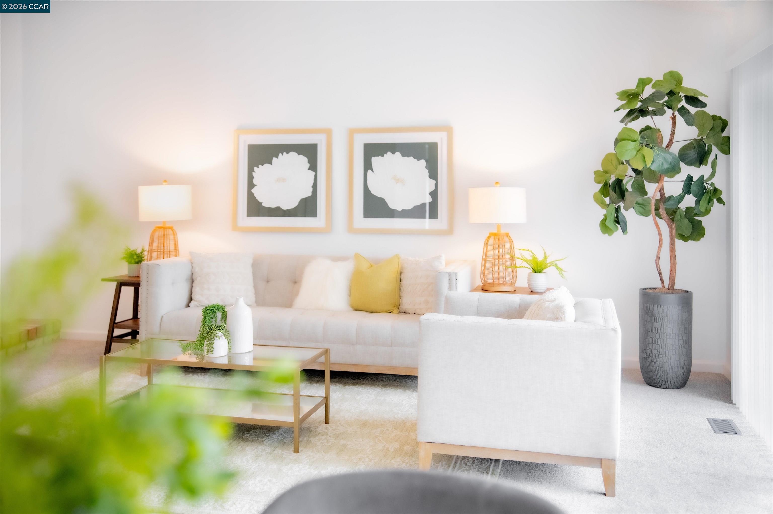 5581 Gonzalez Court Concord, CA 94521 - Photo 14 of 43 a living room with furniture and flowers