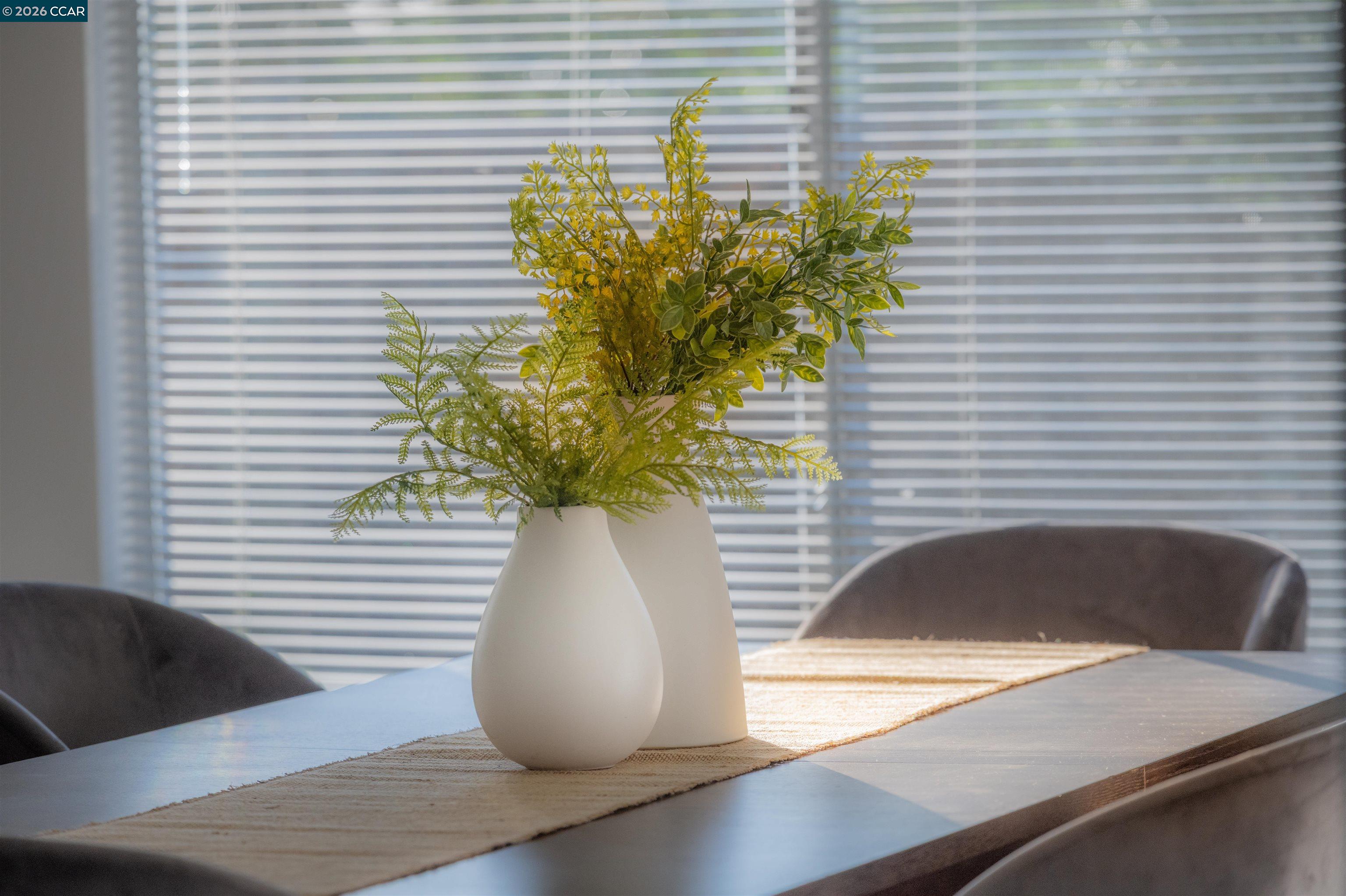 5581 Gonzalez Court Concord, CA 94521 - Photo 23 of 43 a view of a vase of flowers sitting on a table