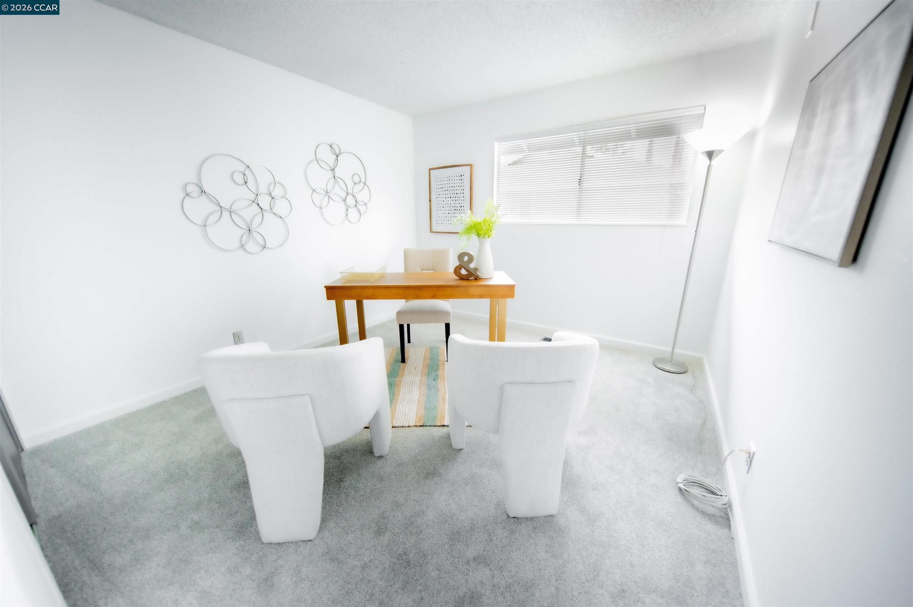5581 Gonzalez Court Concord, CA 94521 - Photo 36 of 43 a living room with a white couch and a table