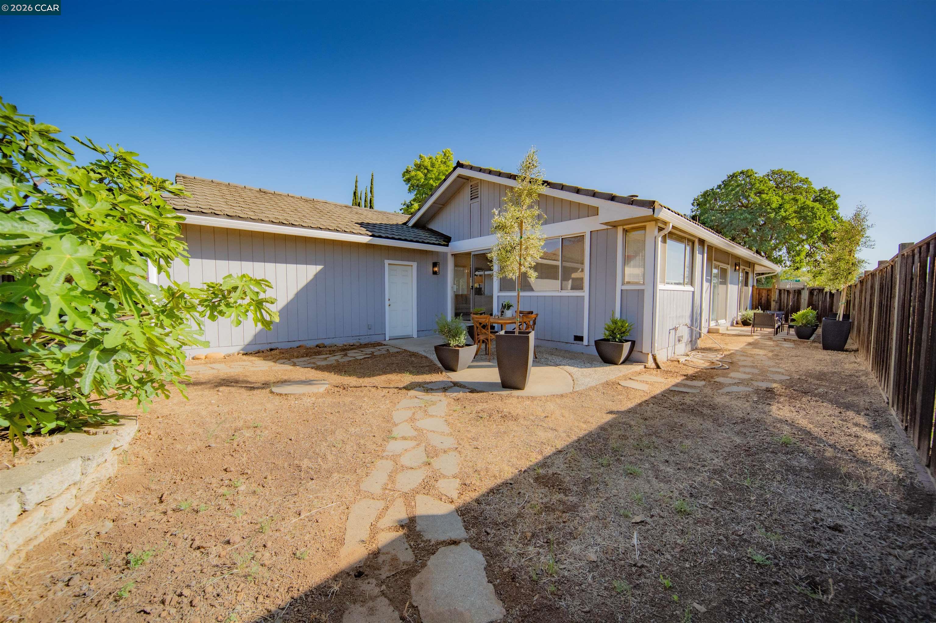 5581 Gonzalez Court Concord, CA 94521 - Photo 41 of 43 a view of a house with a yard