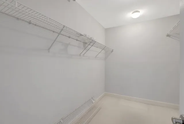 a view of a building with a garden