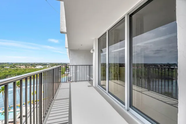 a view of a balcony next to a lake view