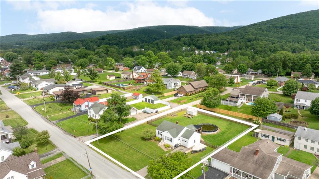 210 Hopwood Fairchance Road Uniontown, PA 15401 - Photo 3 of 28 a view of a pool with a garden