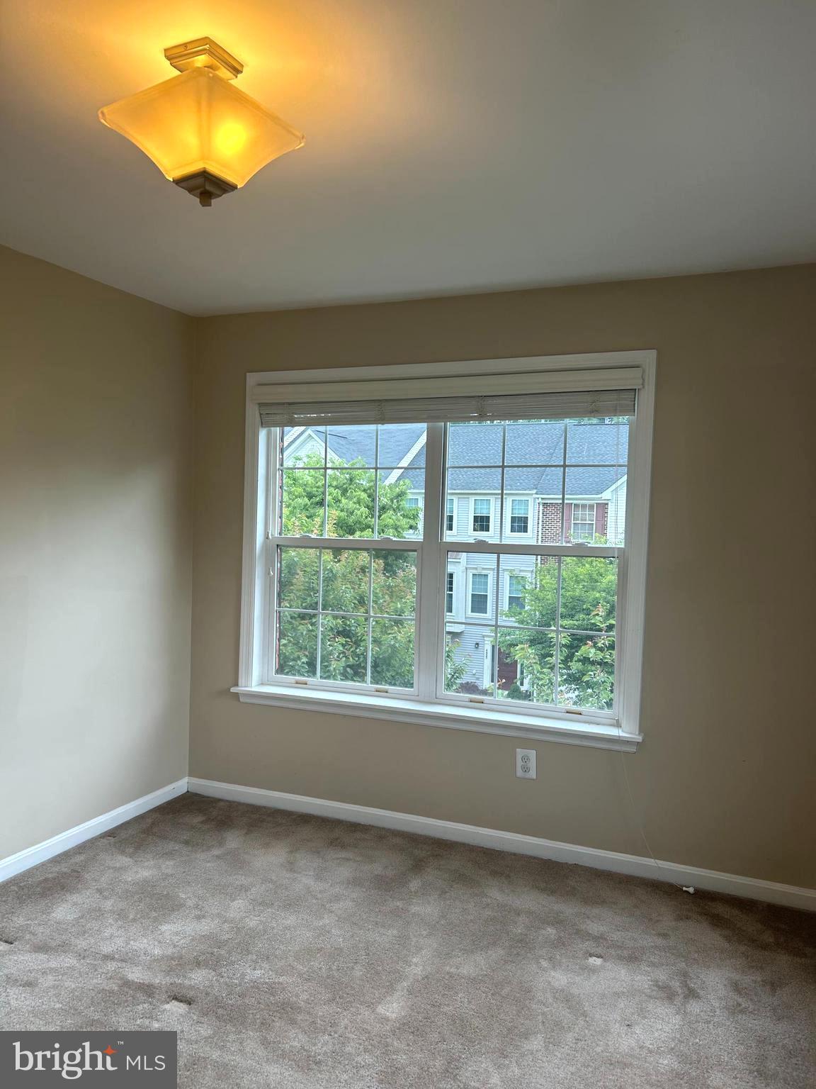 4658 Buckhorn Ridge Fairfax, VA 22030 - Photo 16 of 35 an empty room with windows