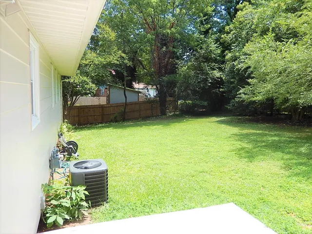 a view of a backyard with a garden
