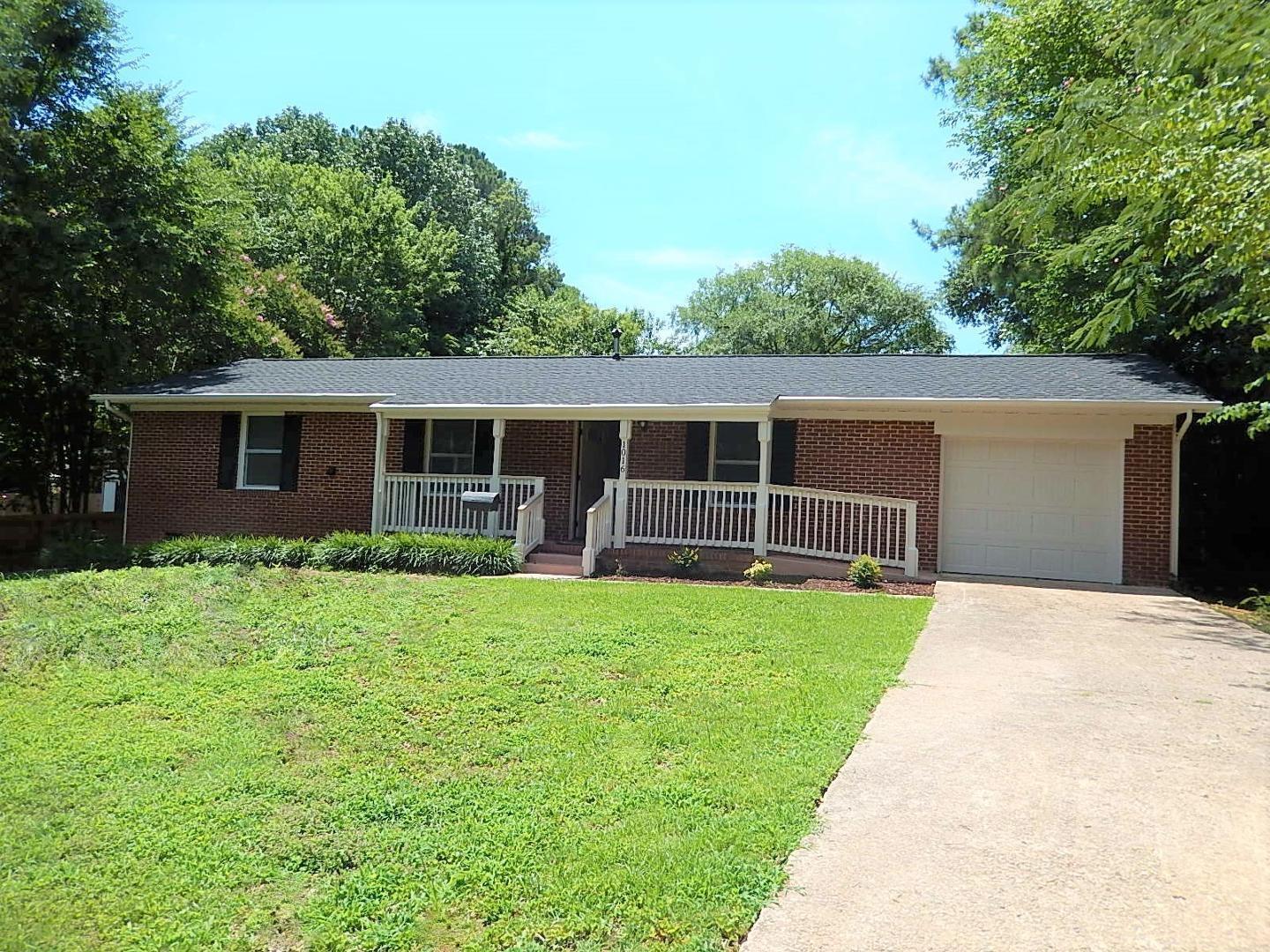 1016 Caspan Street Raleigh, NC 27610 - Photo 3 of 27 a front view of house with yard and green space