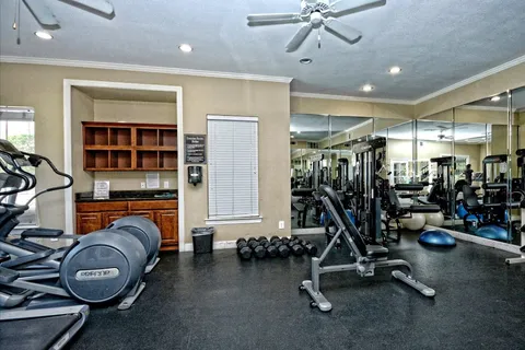 a view of a room with gym equipment