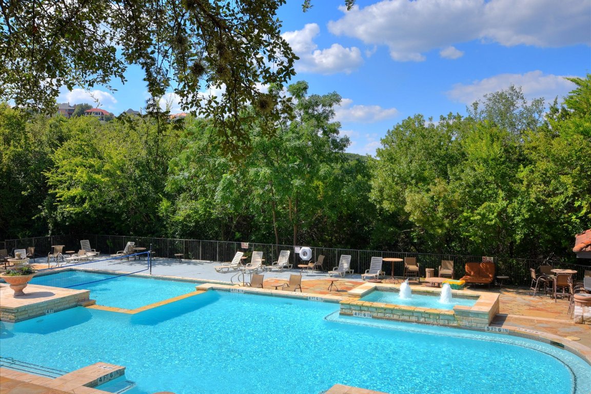 6000 Shepherd Mountain Cove, Unit 1805 Austin, TX 78730 - Photo 18 of 20 a view of a swimming pool with chairs
