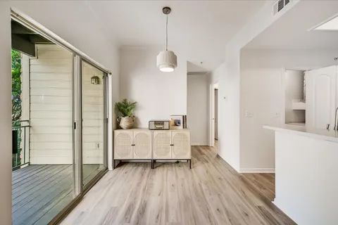 a very nice looking room with wooden floor