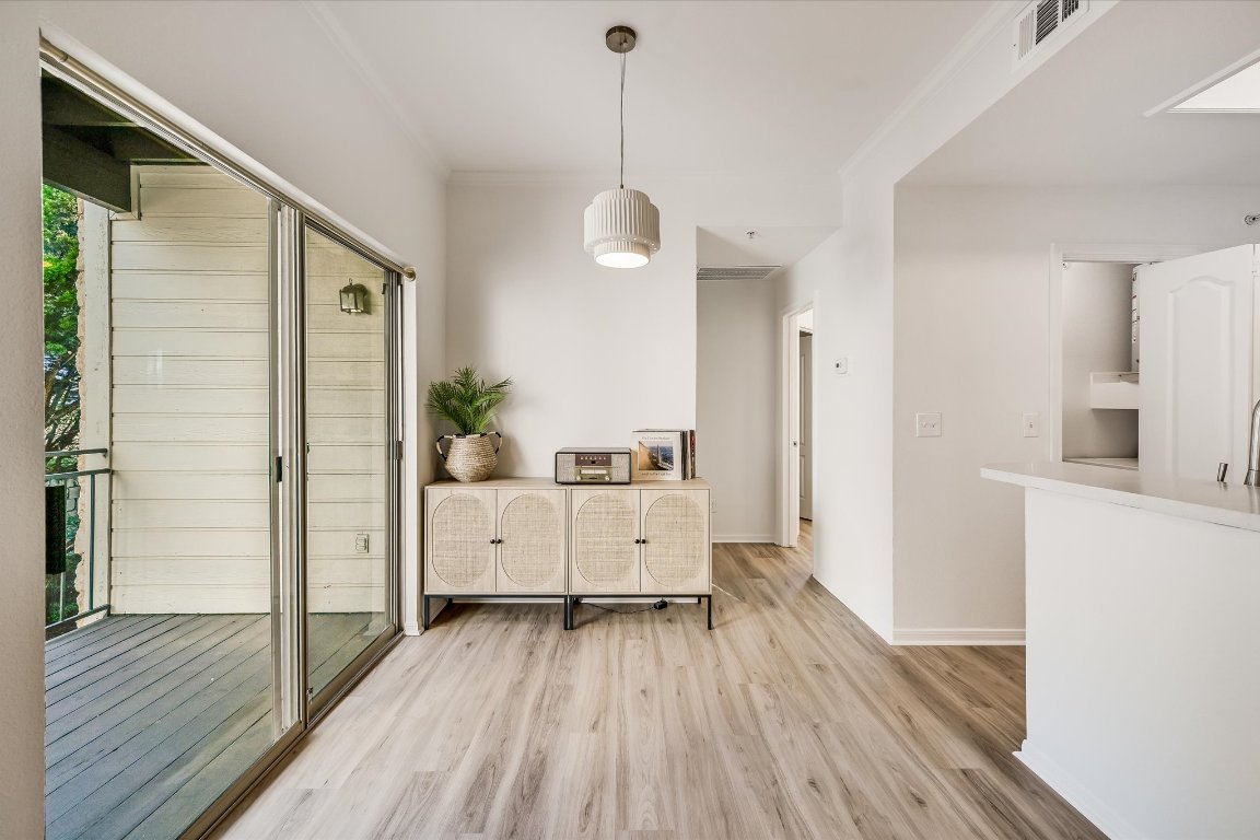 6000 Shepherd Mountain Cove, Unit 1805 Austin, TX 78730 - Photo 6 of 20 a very nice looking room with wooden floor