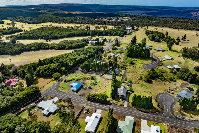 an aerial view of a swimming pool and outdoor space