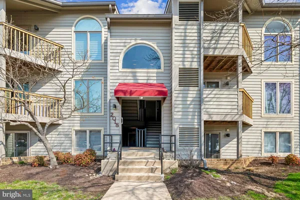 a view of a balcony with wooden floor