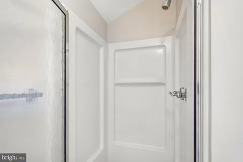 a view of a lake with a city