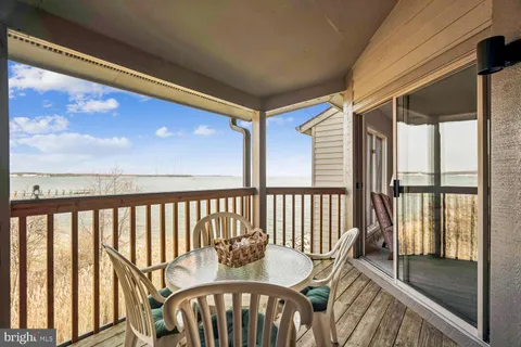 a view of a bedroom with furniture