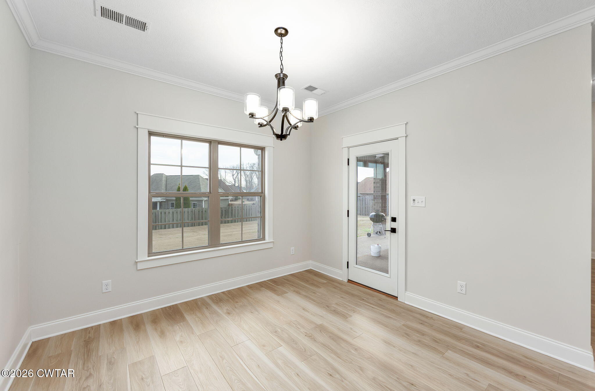 126 Isaiah Drive Jackson, TN 38305 - Photo 11 of 32 a view of an empty room with a window