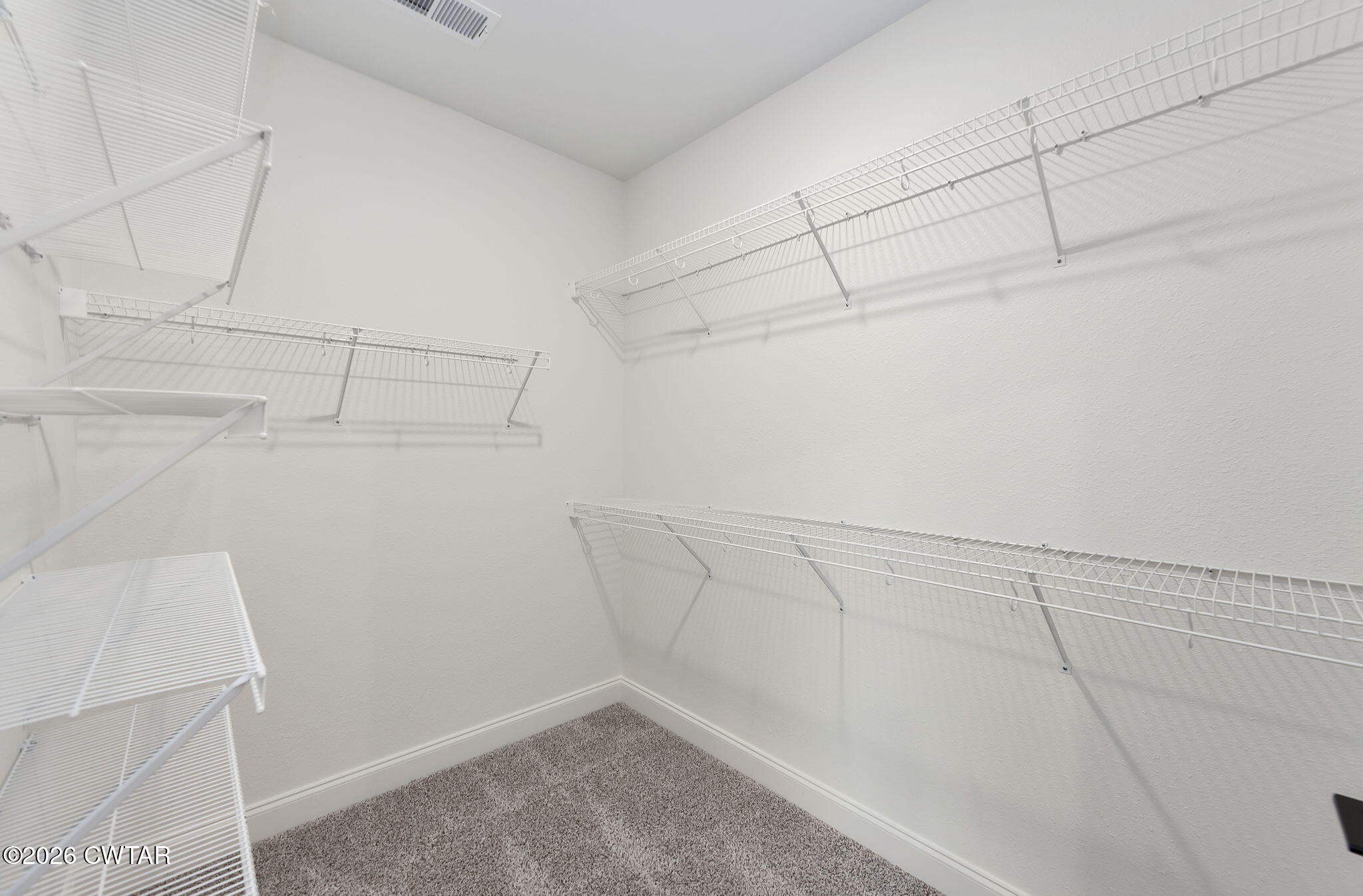 126 Isaiah Drive Jackson, TN 38305 - Photo 20 of 32 a view of a room with racks on the wall