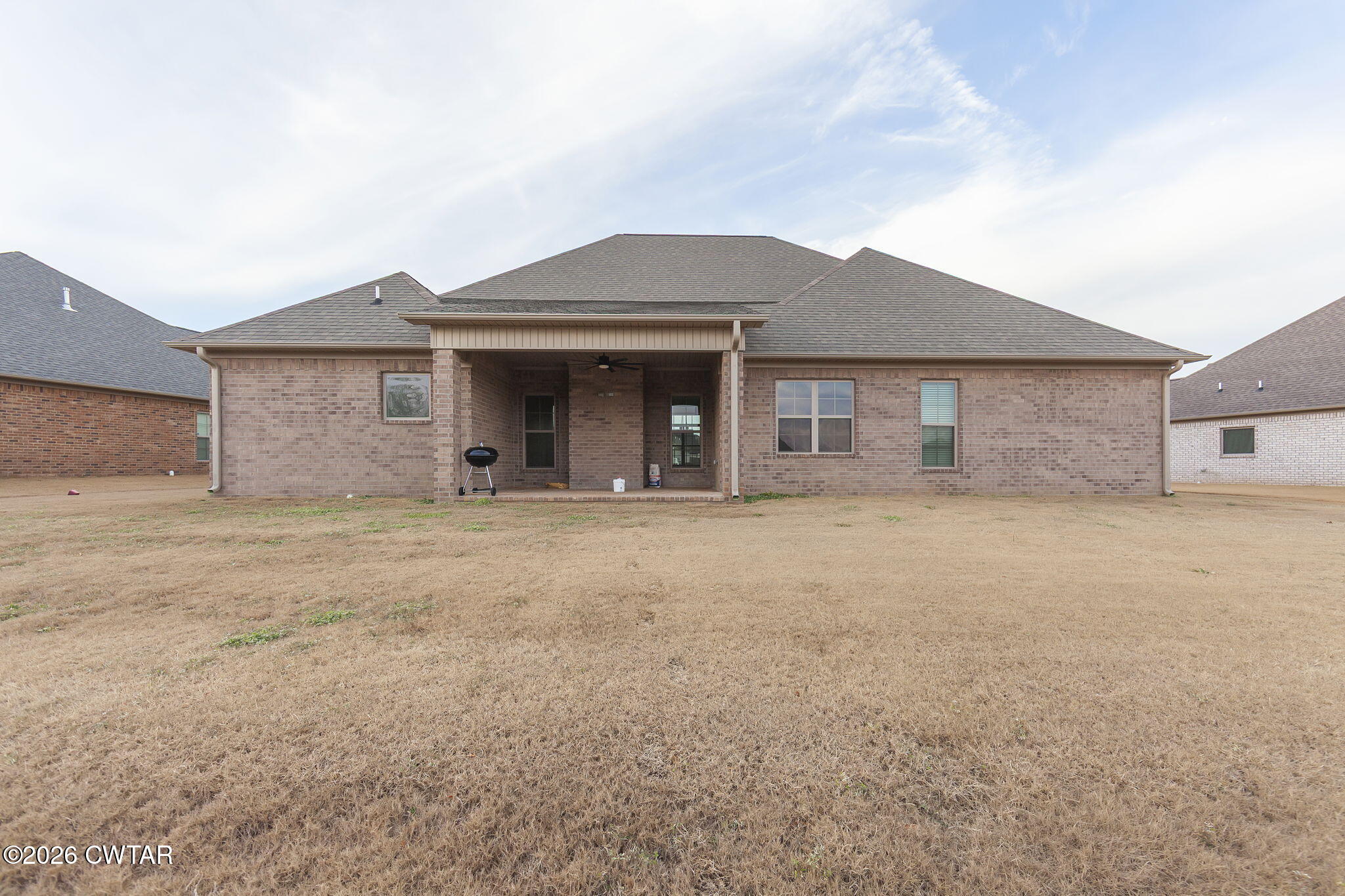 126 Isaiah Drive Jackson, TN 38305 - Photo 29 of 32 a view of a house with a yard
