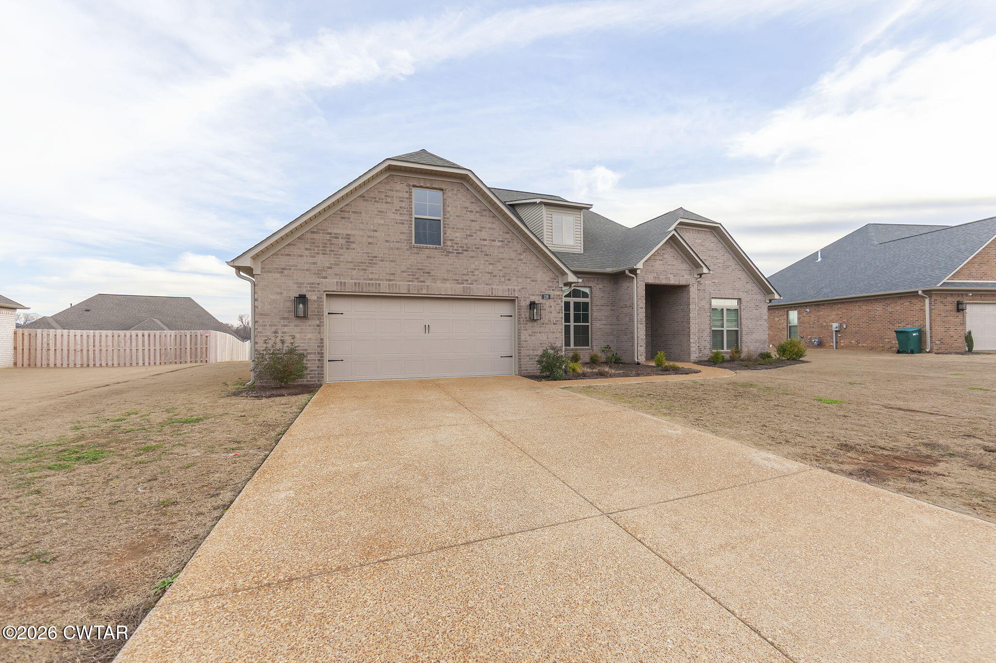 126 Isaiah Drive Jackson, TN 38305 - Photo 31 of 32 a house view with a outdoor space