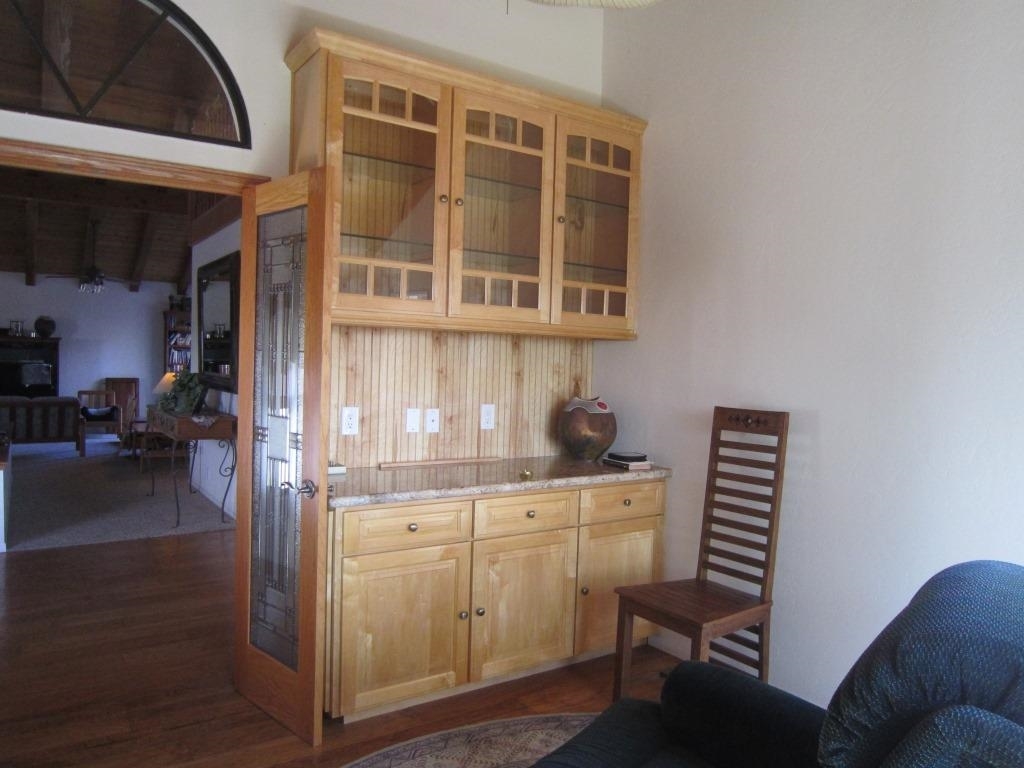 6057 Rainbow Heights Road Fallbrook, CA 92028 - Photo 5 of 25 With built-ins, arched window, balcony and double leaded glass doors!