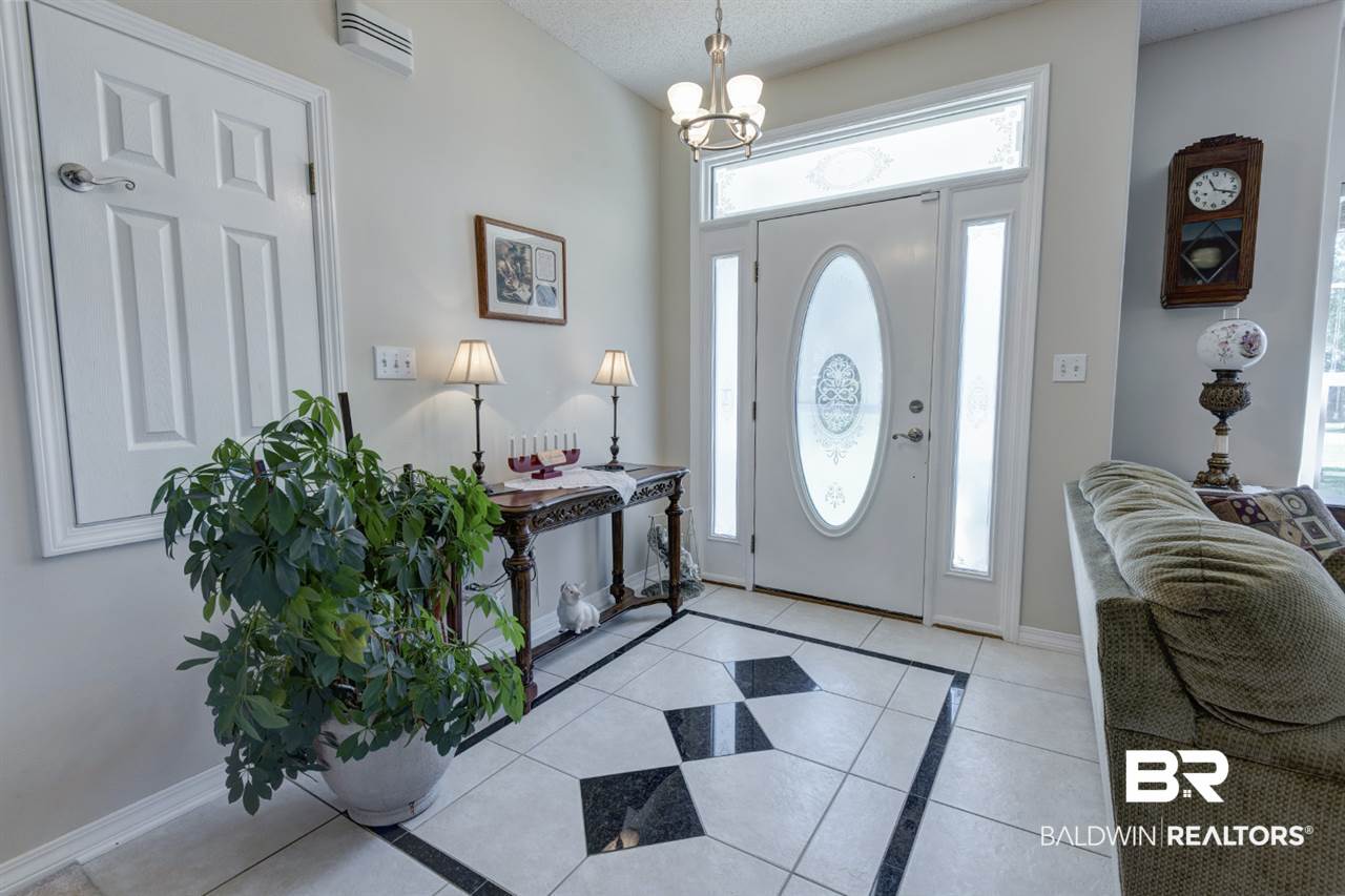 22195 Buck Road Robertsdale, AL 36567 - Photo 9 of 36 Custom Tile/Stone Accent Flooring in Foyer