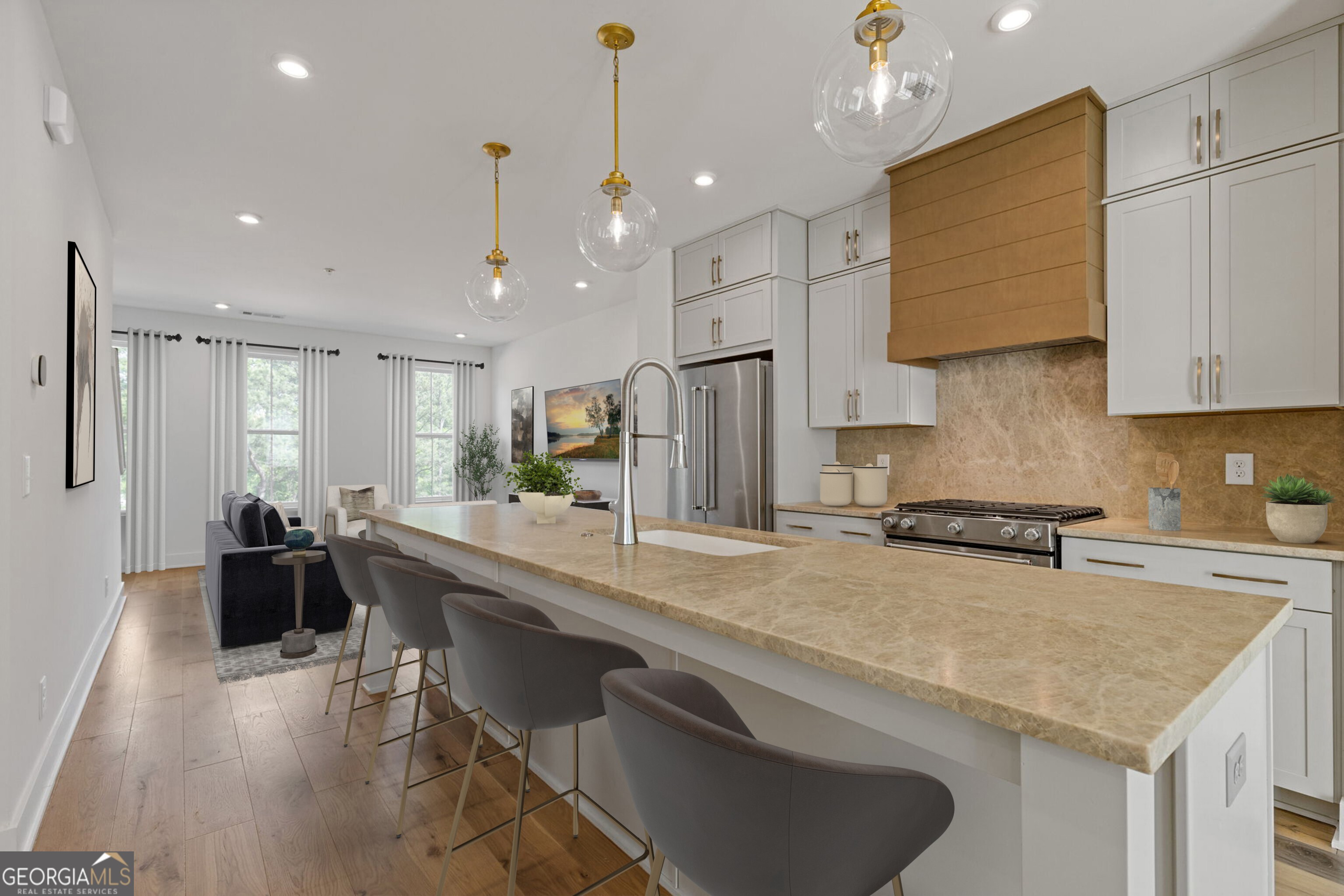 a kitchen with stainless steel appliances granite countertop a sink a stove and a refrigerator