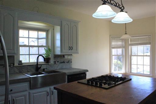 3268 Clear Creek Road Pulaski, TN 38478 - Photo 6 of 27 Concrete Counter-Tops and Hardwood Flooring Throughout