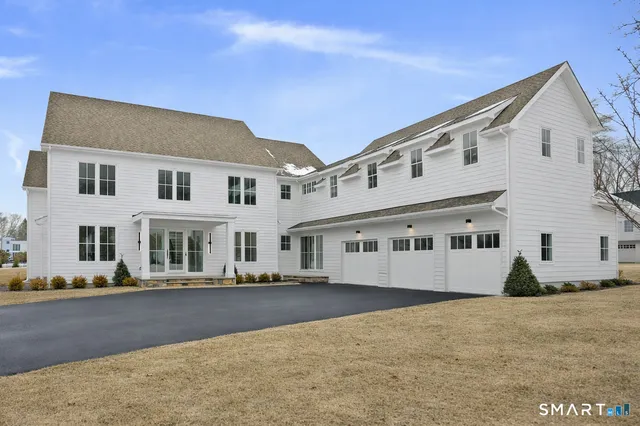 a front view of a building with a street