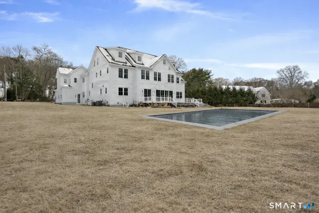 a picture of a bathroom with a shower