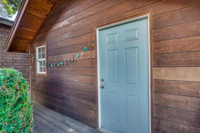 a view of door and wooden floor