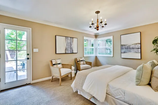 a bedroom with bed and window